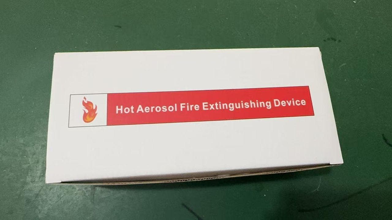 Compact hot aerosol device inside an enclosure
